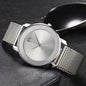 A Stylish Women'S Quartz Watch with a Mesh Strap - Featuring a Golden round Dial, Fashionable Zinc Alloy Strap and Case, a Casual Decorative Accessory, Perfect as a Ramadan Gift or a Present for Mom.